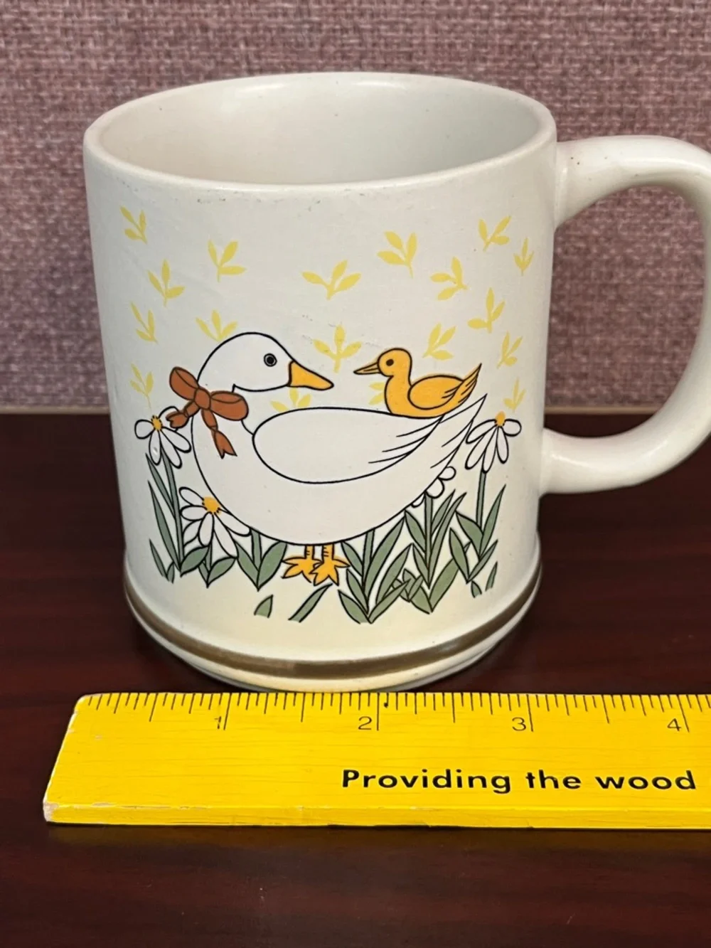 1980s ceramic coffee mug featuring a cute mother duck and duckling.